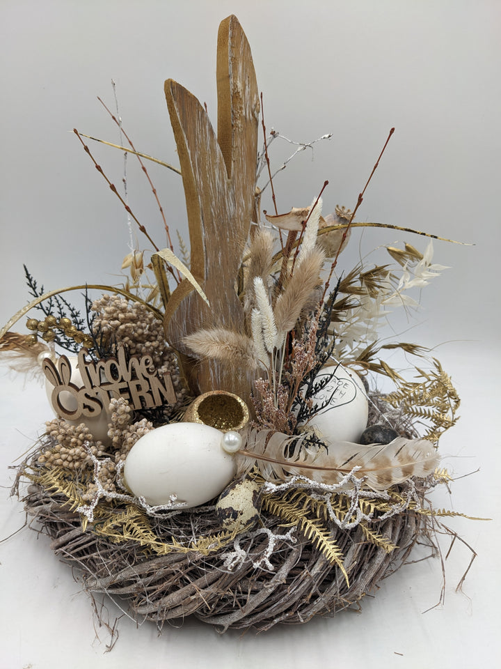 Ostergesteck Frühlingsgesteck Hase Gräser Eier natur gold