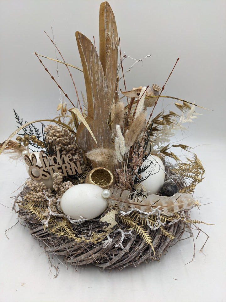 Ostergesteck Frühlingsgesteck Hase Gräser Eier natur gold