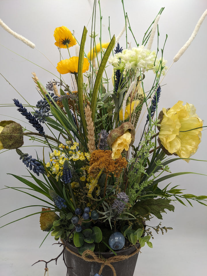 Frühlingsgesteck Gräser Hyazinthen gelb blau
