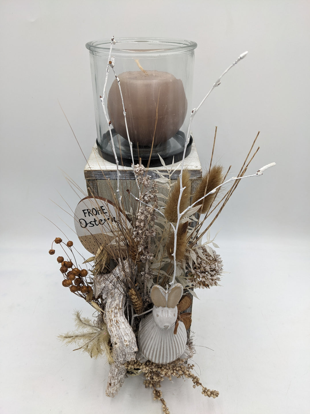 Ostergesteck Frühlingsgesteck Gräser Hase Kerze natur