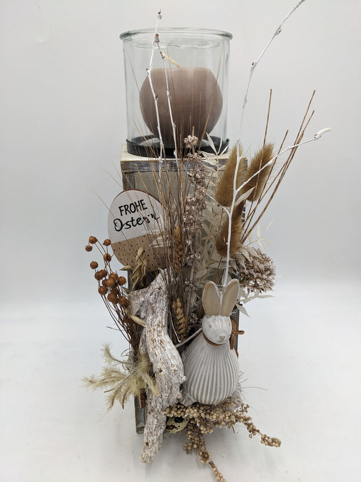 Ostergesteck Frühlingsgesteck Gräser Hase Kerze natur