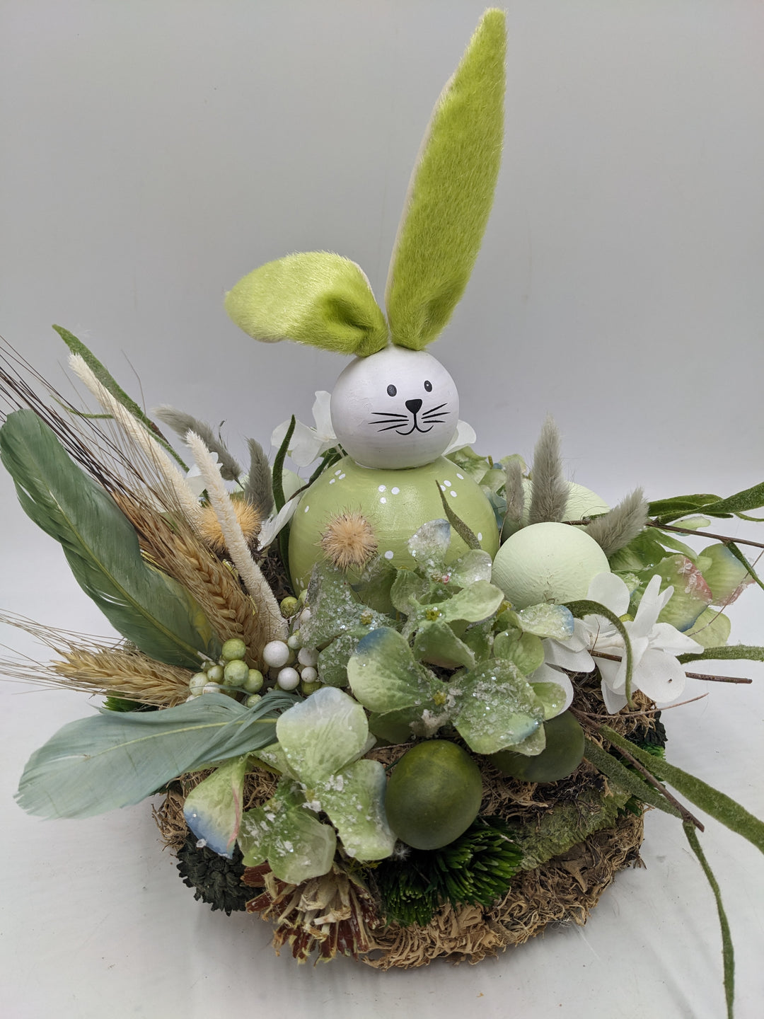 Ostergesteck Frühlingsgesteck Hase Gräser Eier grün