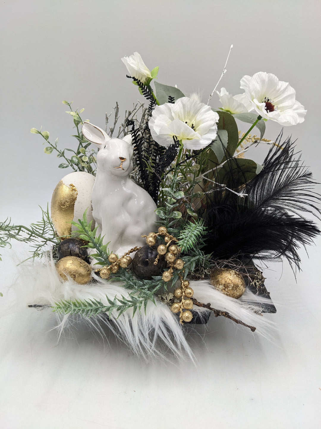 Ostergesteck Frühlingsgesteck Eier schwarz weiss gold