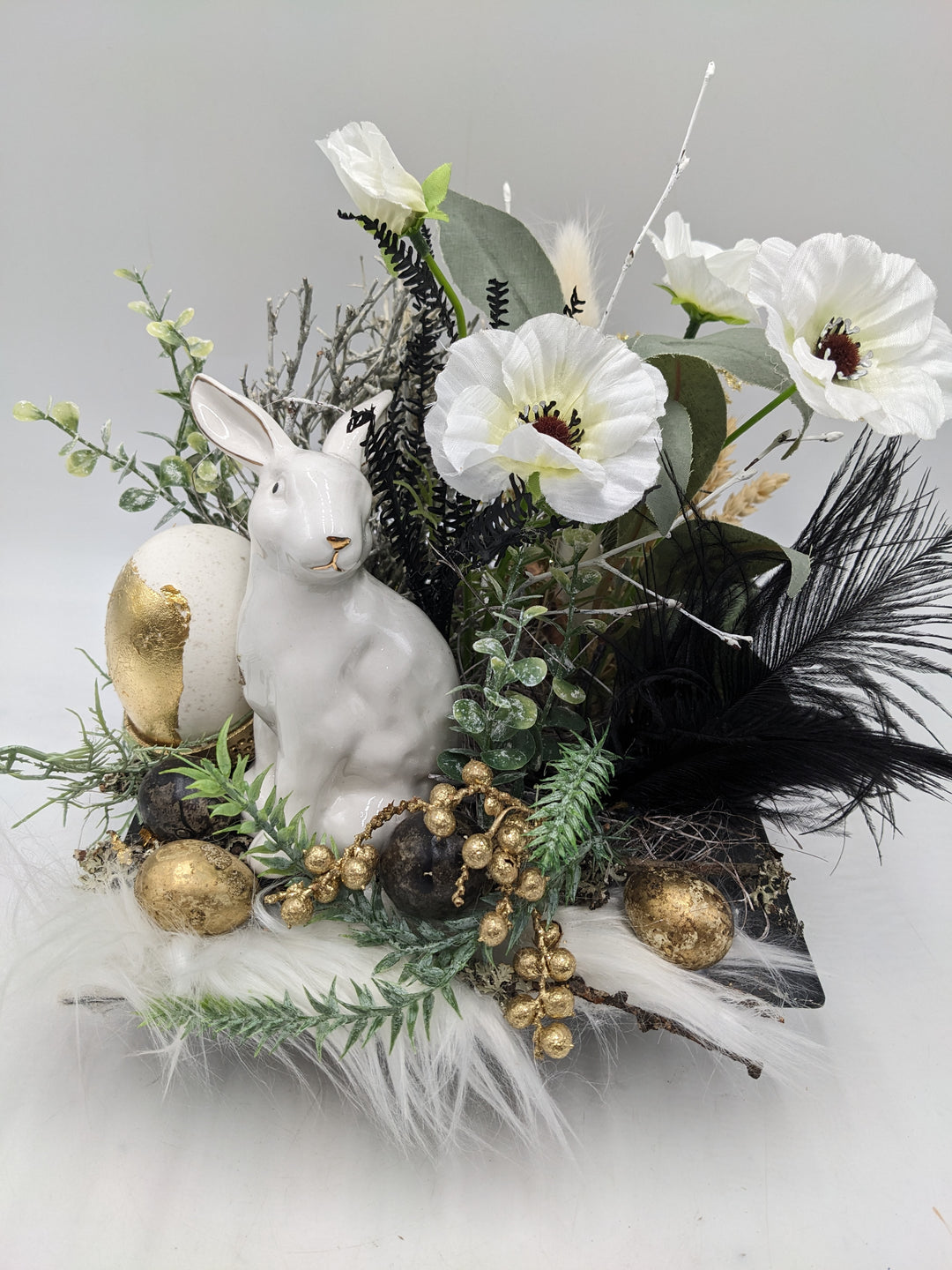 Ostergesteck Frühlingsgesteck Eier schwarz weiss gold