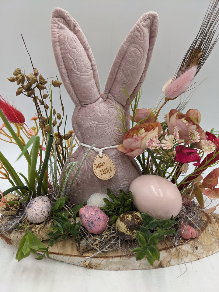 Ostergesteck Frühlingsgesteck Gräser Ranunkel rosa