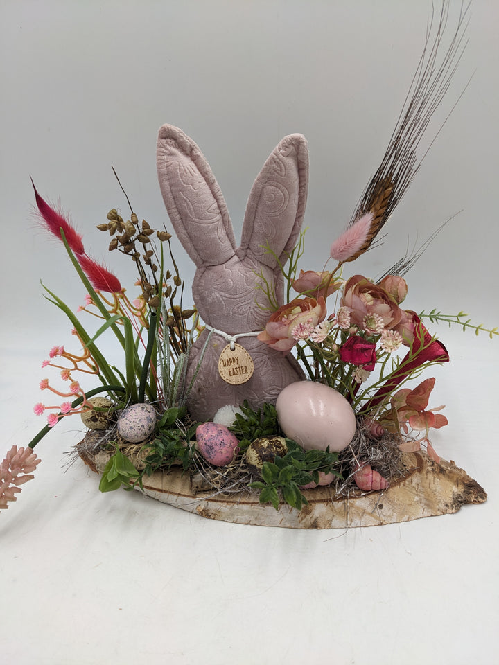 Ostergesteck Frühlingsgesteck Gräser Ranunkel rosa