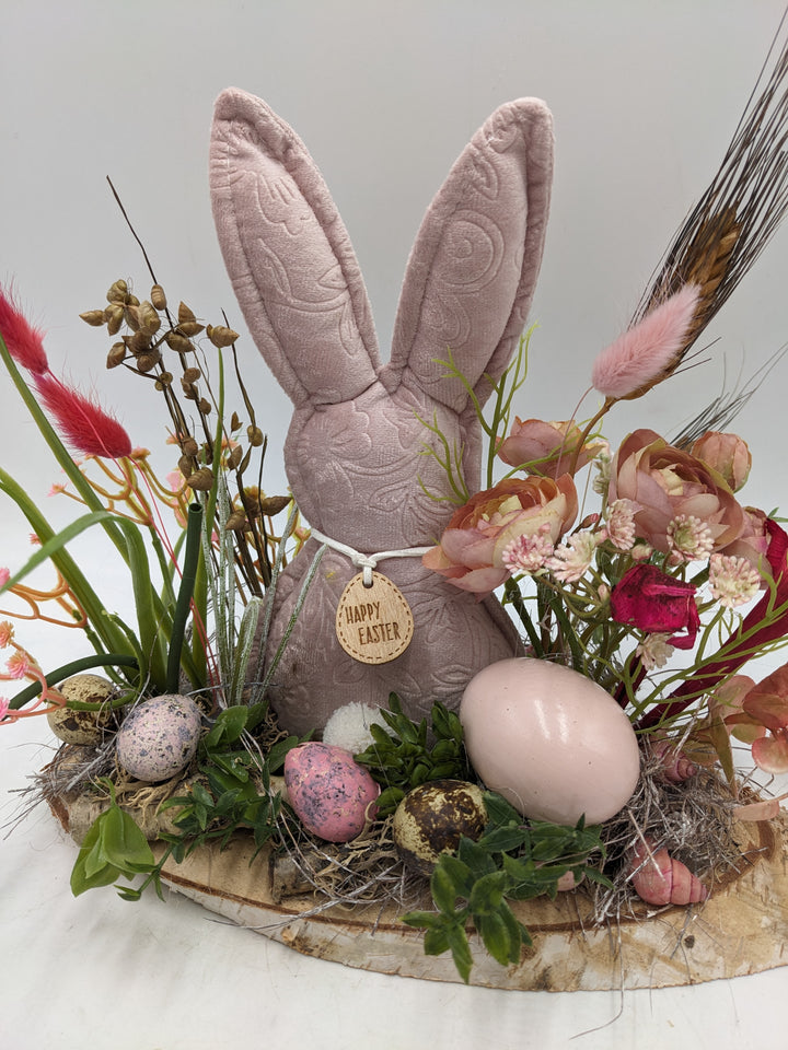 Ostergesteck Frühlingsgesteck Gräser Ranunkel rosa