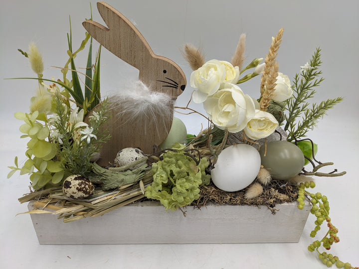Ostergesteck Frühlingsgesteck Ranunkel Gräser weiss grün