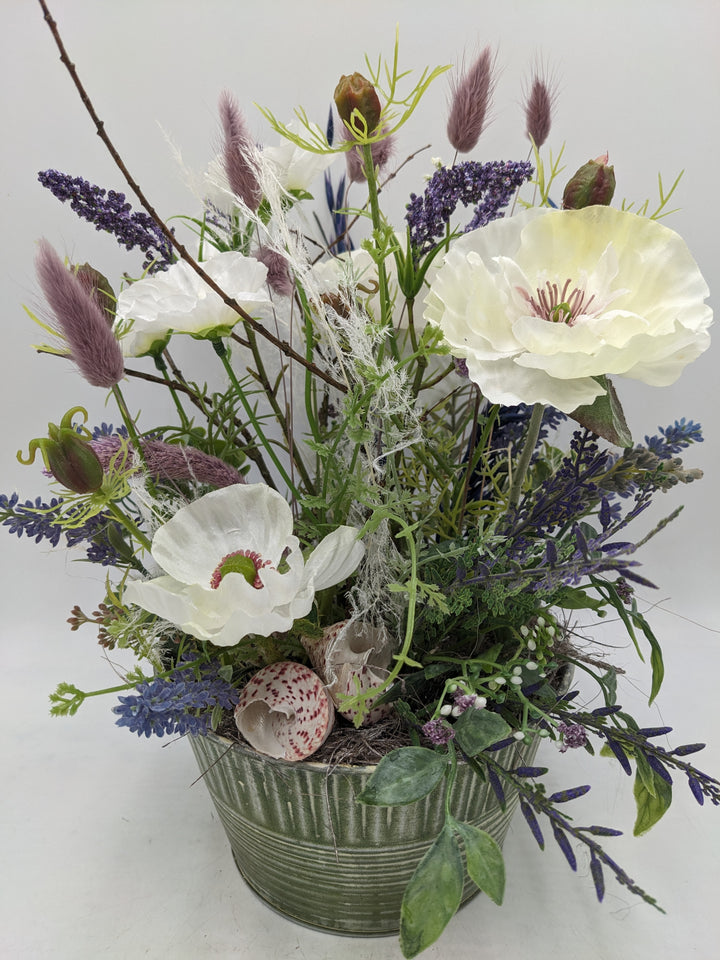 Sommergesteck Lavendel Gräser Mohn lila weiss