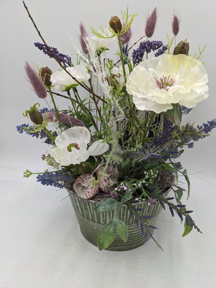 Sommergesteck Lavendel Gräser Mohn lila weiss