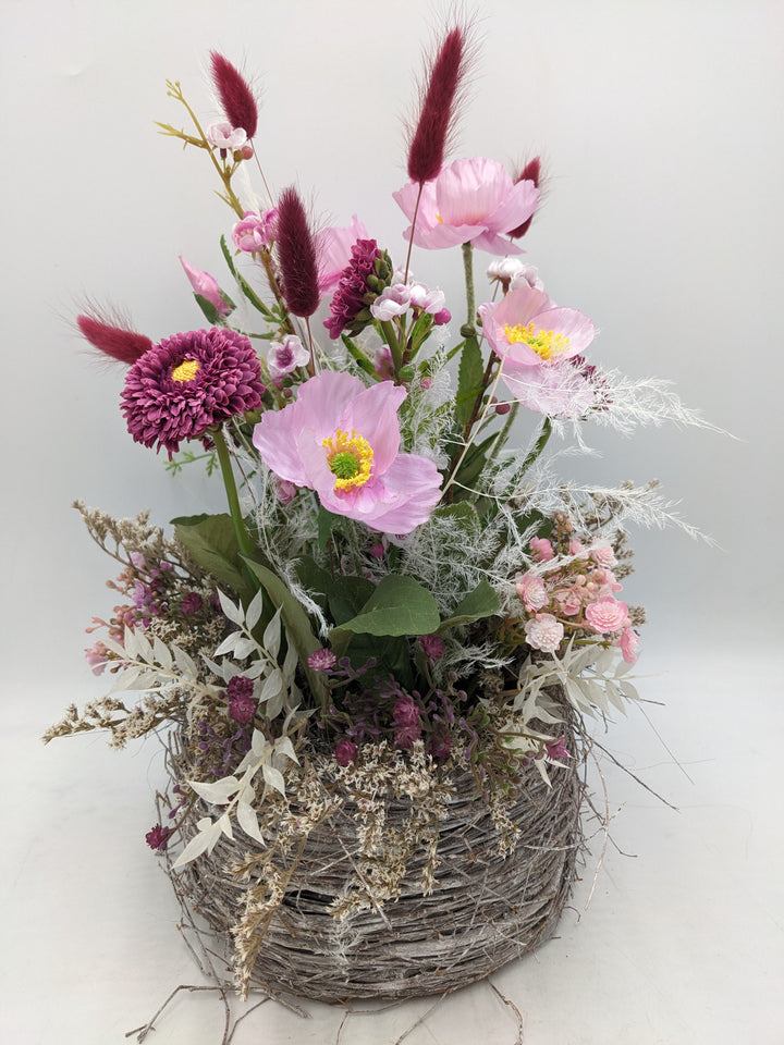 Frühlingsgesteck Mohn Gräser Chrysanthemen rosa