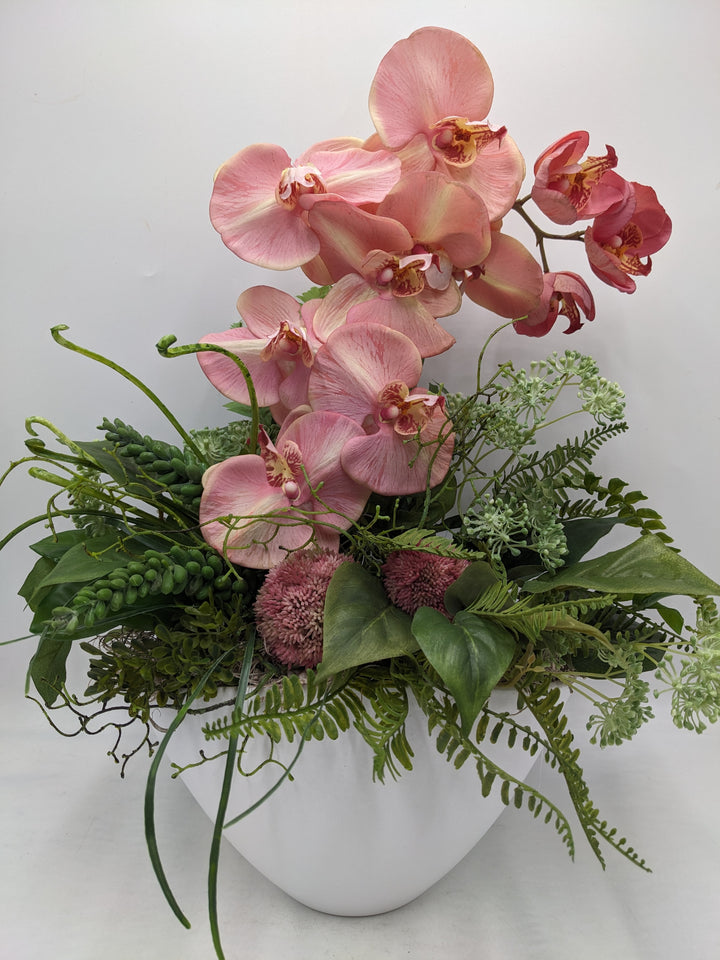 Frühlingsgesteck Orchideen Sedum rosa