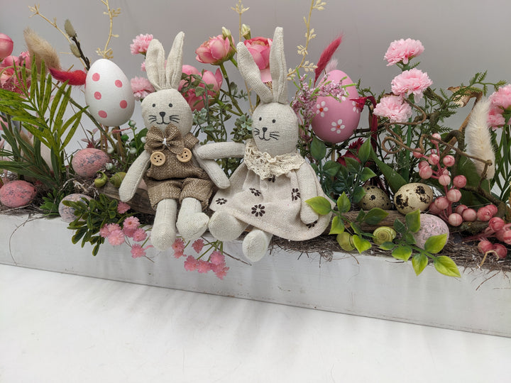 Ostergesteck Frühlingsgesteck Hasen Ranunkeln rosa
