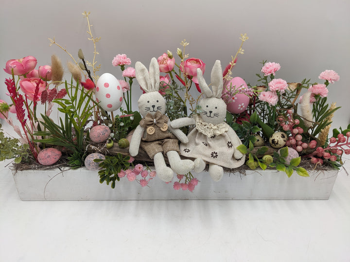 Ostergesteck Frühlingsgesteck Hasen Ranunkeln rosa