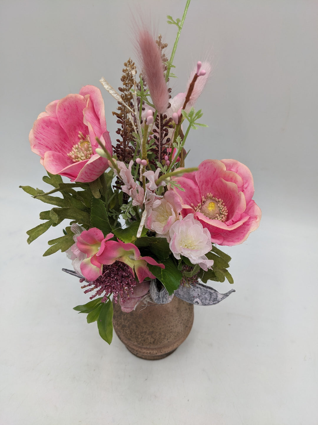 Frühlingsgesteck Vase Mohn Gräser rosa