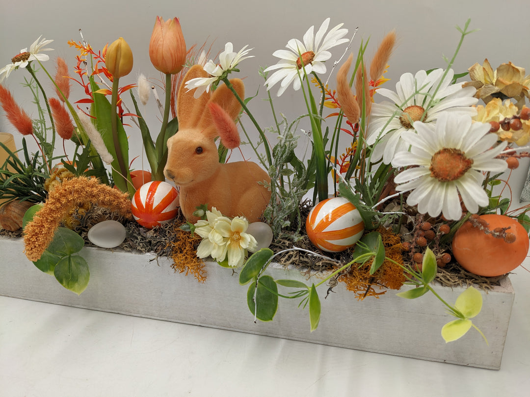 Ostergesteck Frühlingsgesteck Teelicht Hase orange