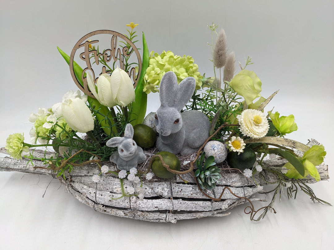 Ostergesteck Frühlingsgesteck Tulpen Bellis Gräser weiss