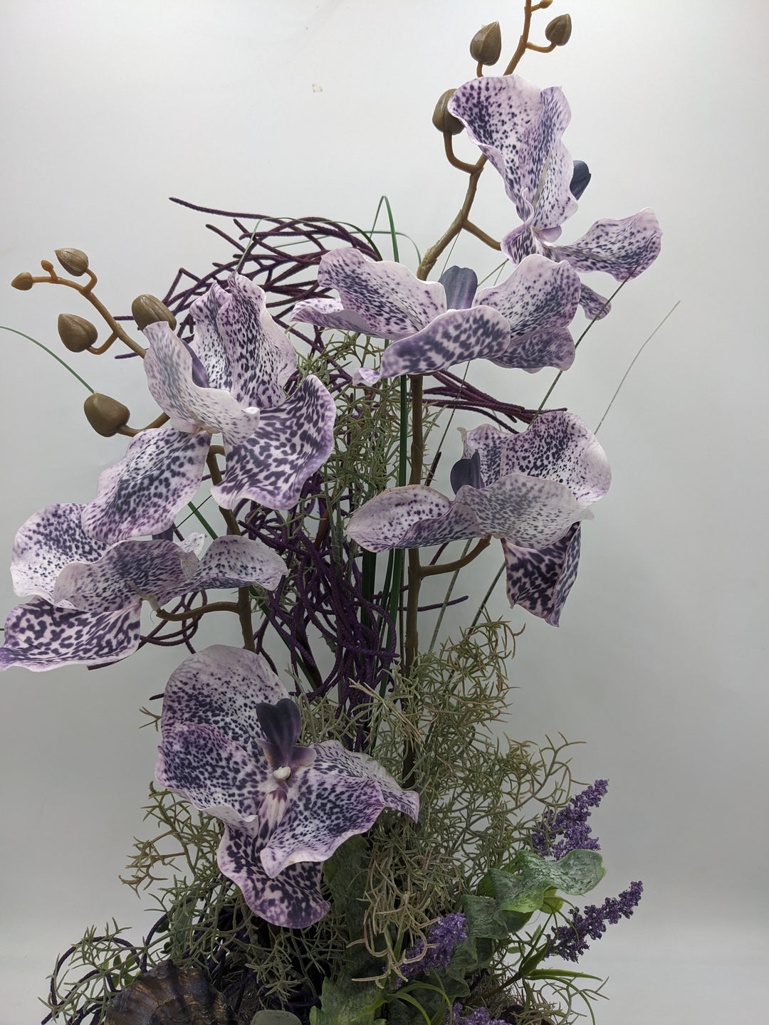 Frühlingsgesteck Orchideen silber lila