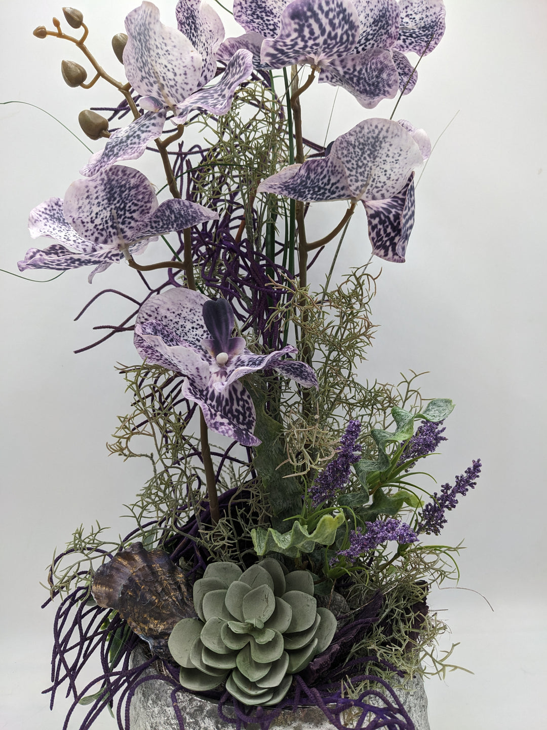 Frühlingsgesteck Orchideen silber lila