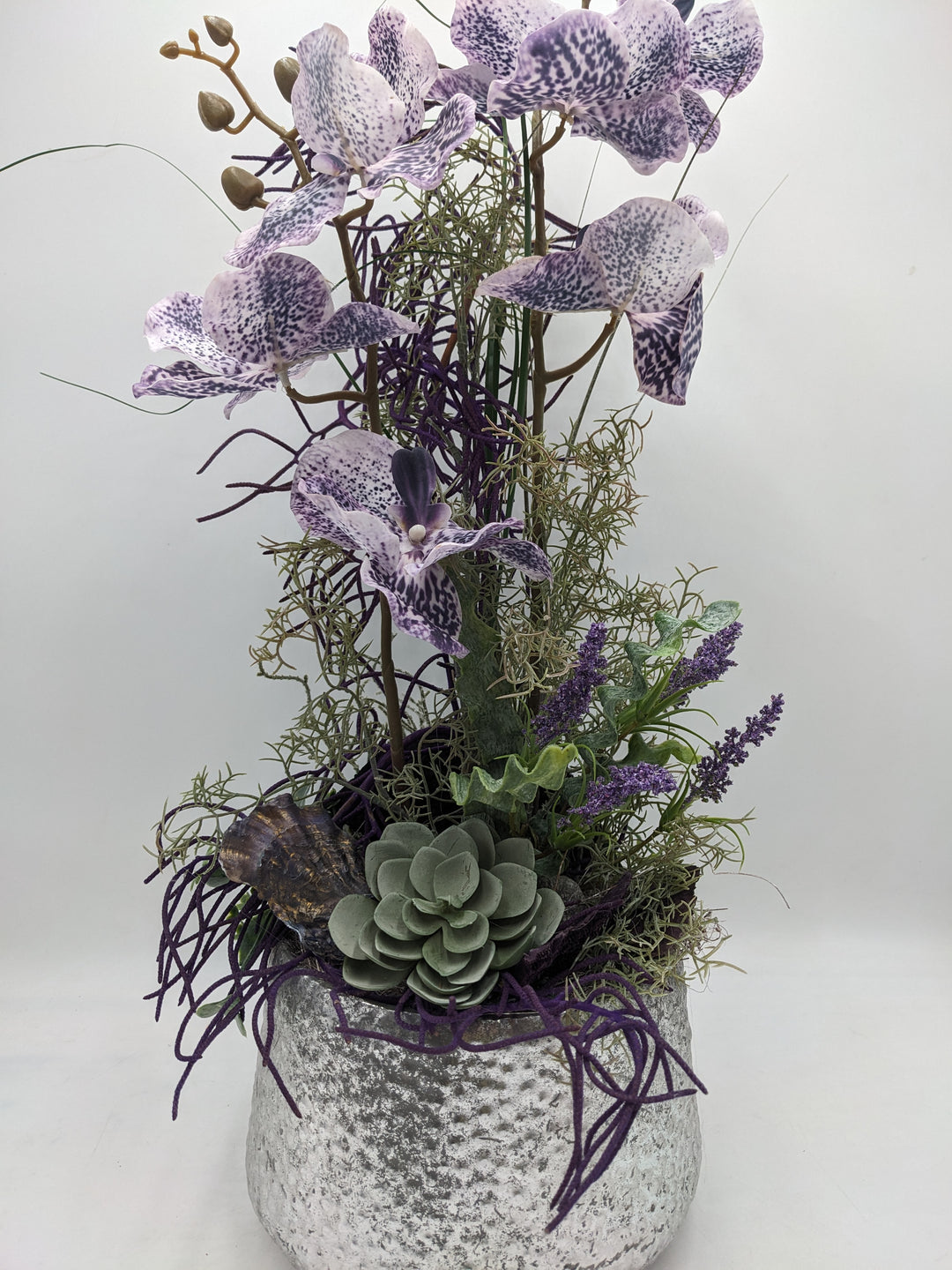Frühlingsgesteck Orchideen silber lila