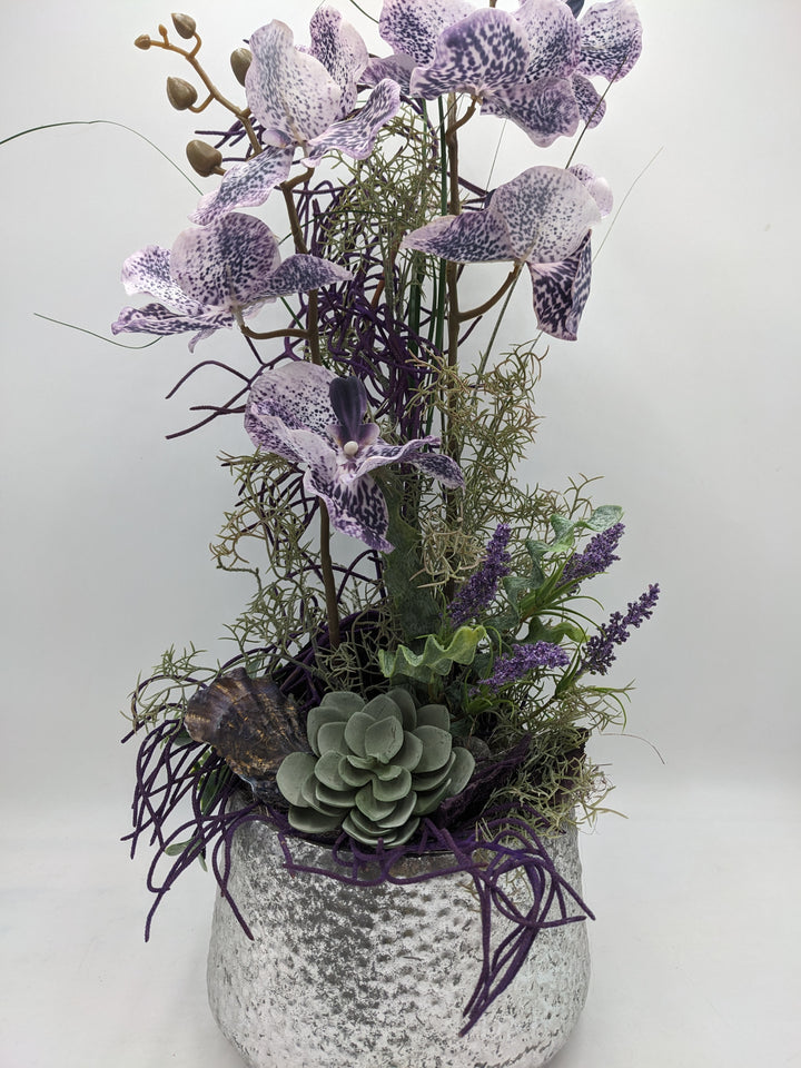 Frühlingsgesteck Orchideen silber lila
