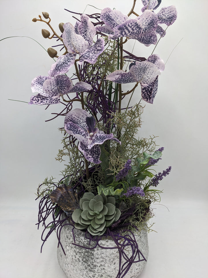 Frühlingsgesteck Orchideen silber lila
