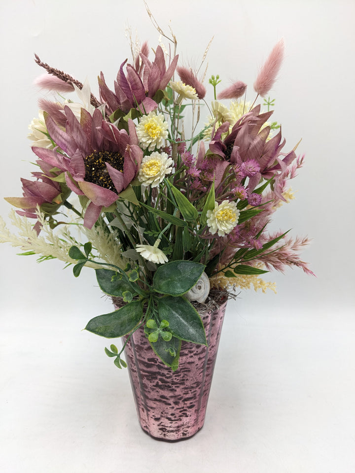 Frühlingsgesteck Gräser Sonnenblumen rosa weiss
