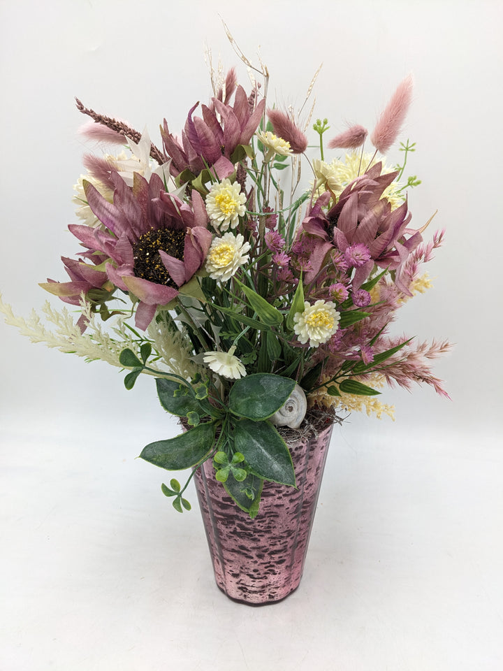 Frühlingsgesteck Gräser Sonnenblumen rosa weiss
