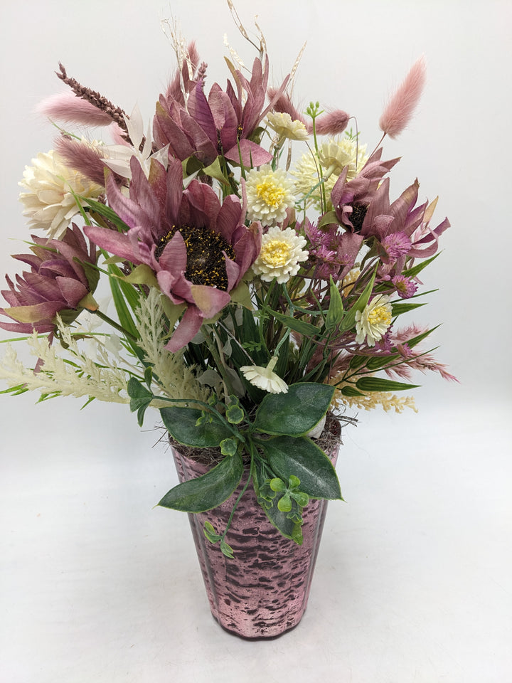 Frühlingsgesteck Gräser Sonnenblumen rosa weiss