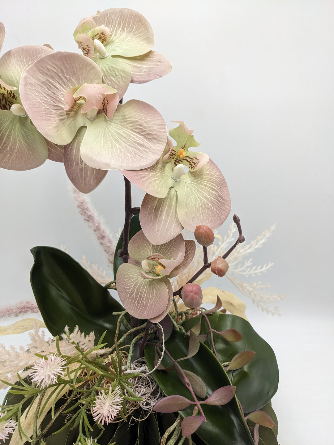 Orchideengesteck Frühling Gräser grün rosa