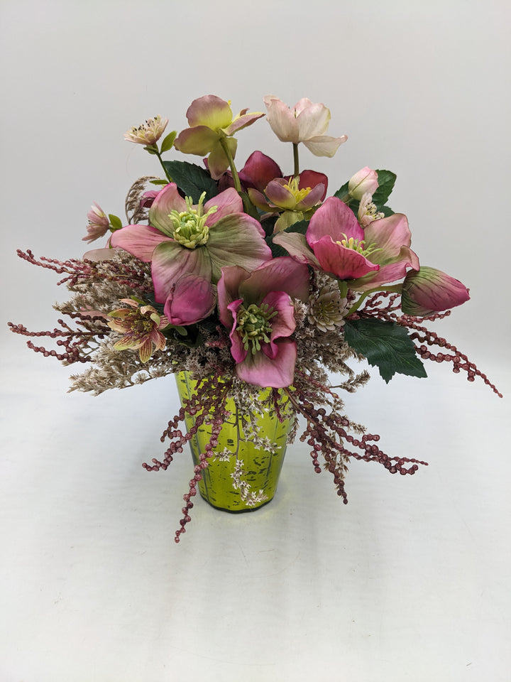 Frühlingsgesteck Christrosen lila rosa