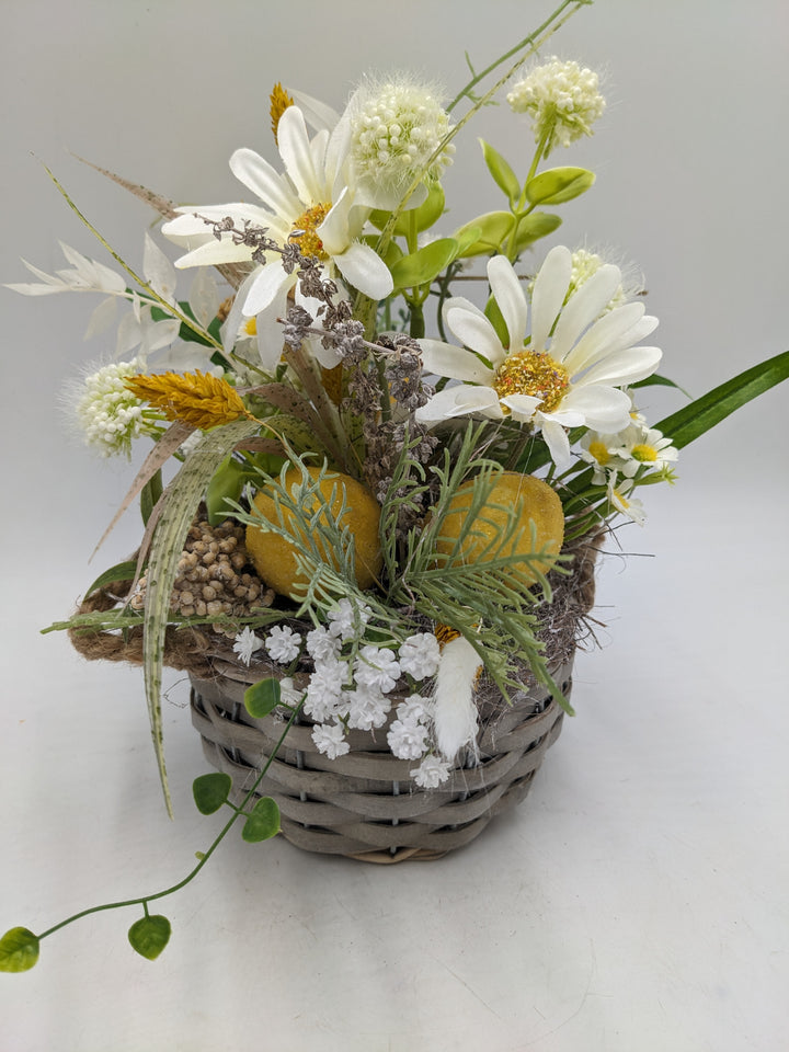 Frühlingsgesteck Zitronen Margeriten gelb