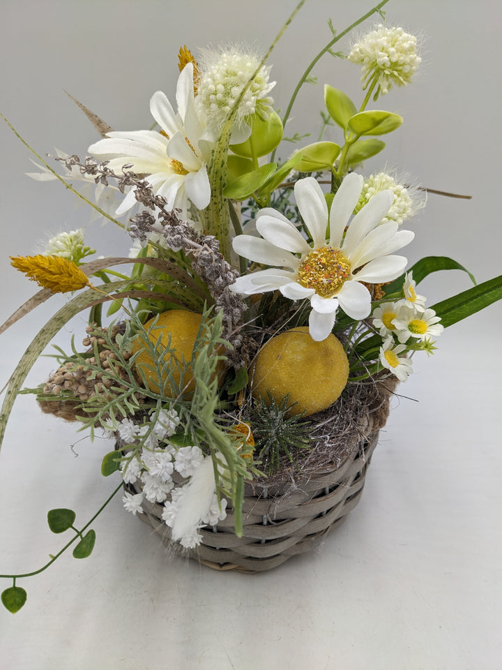 Frühlingsgesteck Zitronen Margeriten gelb