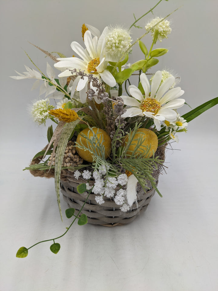 Frühlingsgesteck Zitronen Margeriten gelb
