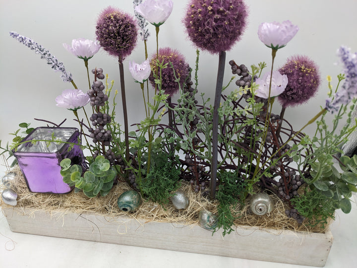 Frühlingsgesteck Teelicht Wiesenblumen lila