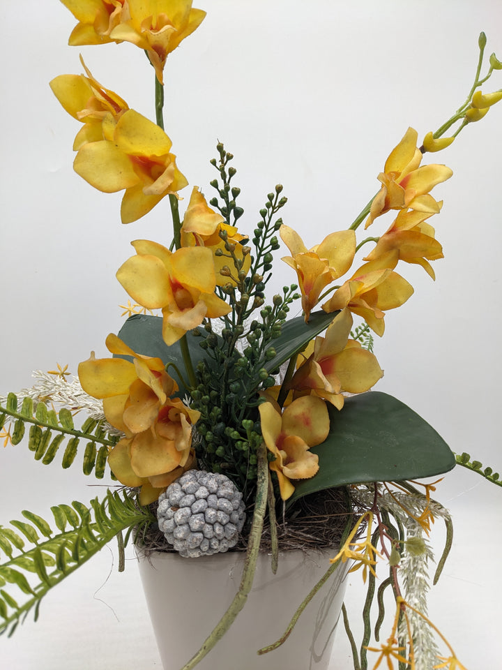 Frühlingsgesteck Orchidee gelb Faru grau