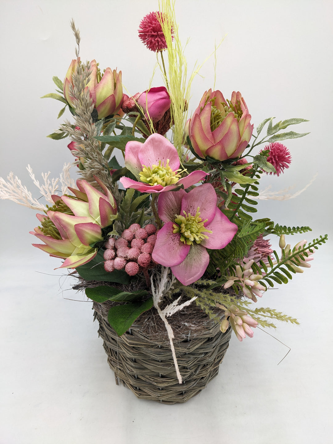 Frühlingsgesteck Christrose Gräser Faru rosa