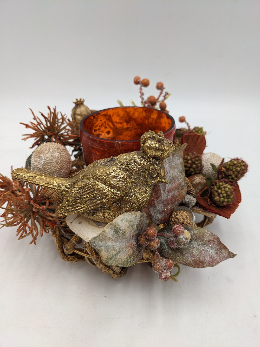 Herbstgesteck Vogel Teelicht Beeren gold