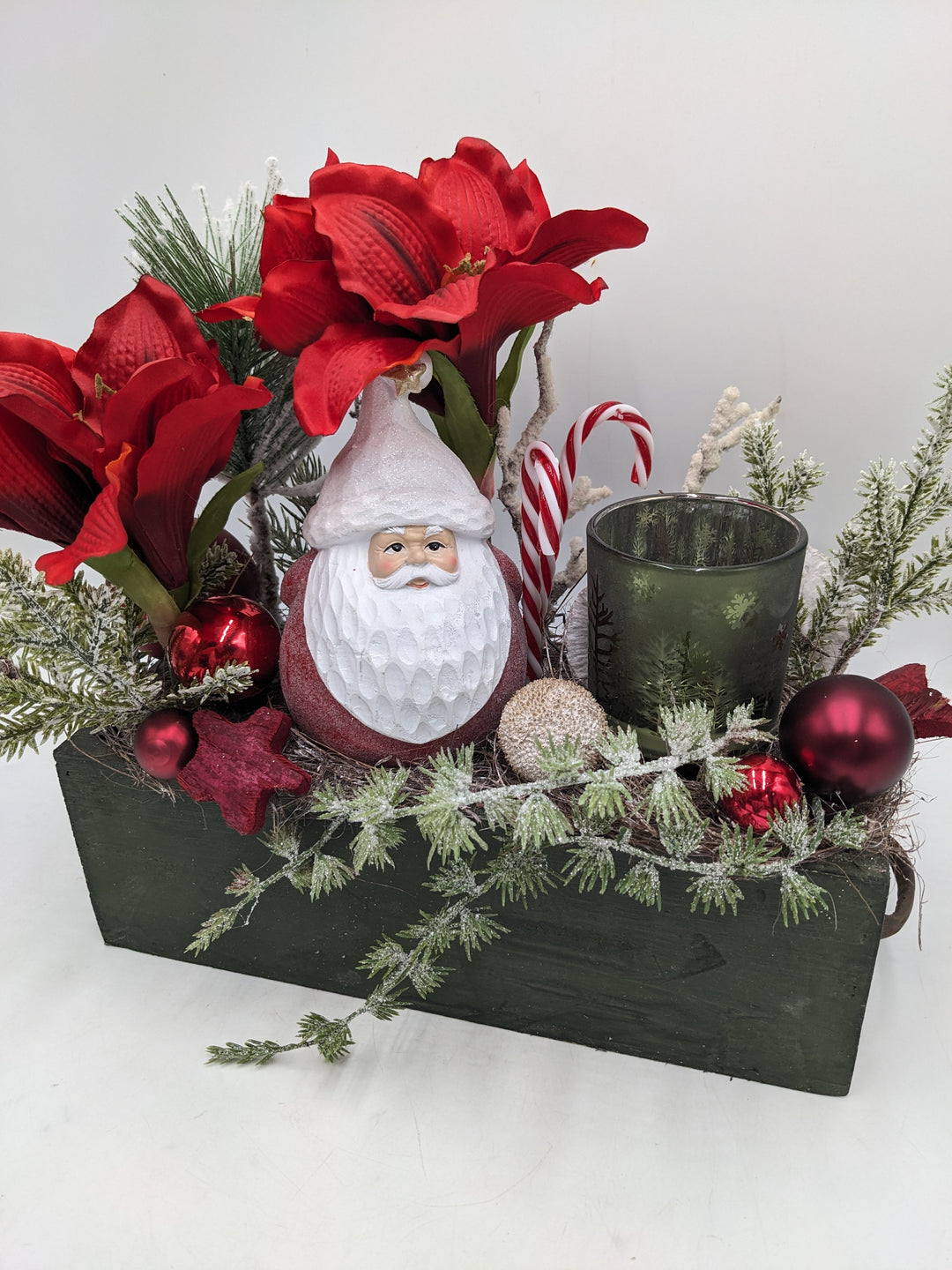 Weihnachtsgesteck Amaryllis Teelicht rot grün