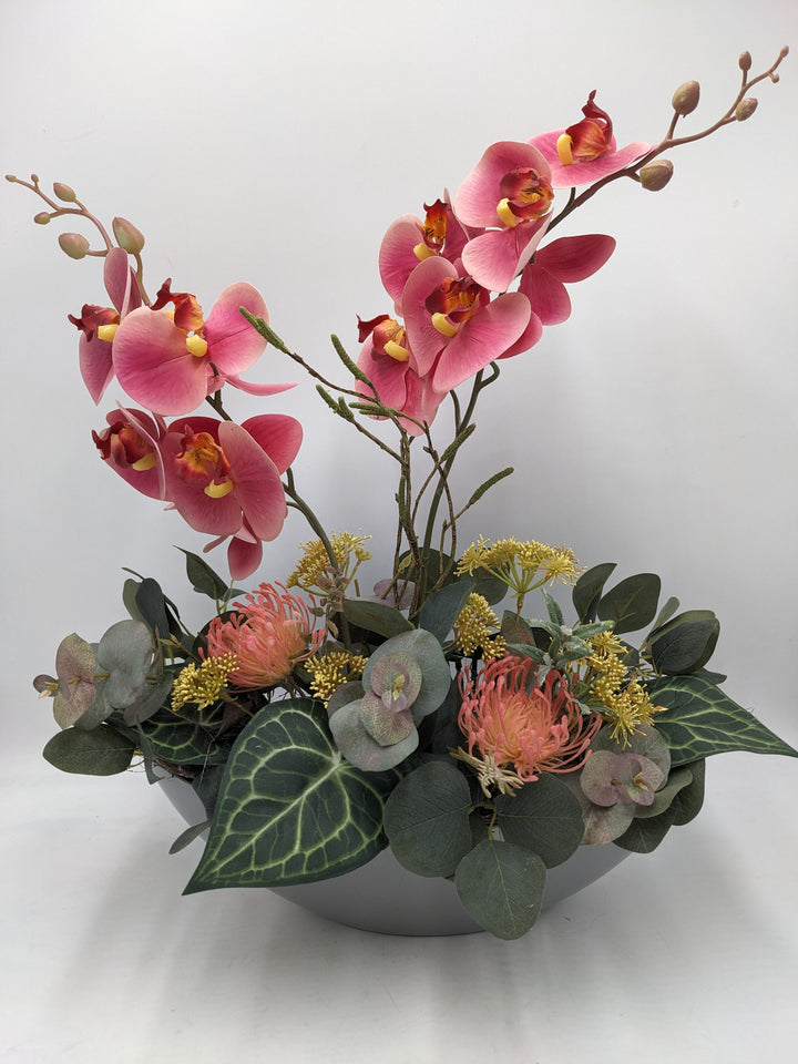 Frühlingsgesteck Orchidee Eukalyptus rosa grau