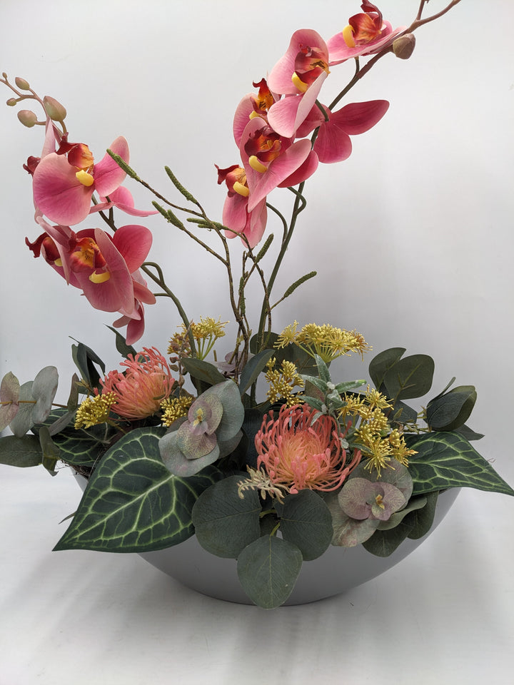 Frühlingsgesteck Orchidee Eukalyptus rosa grau