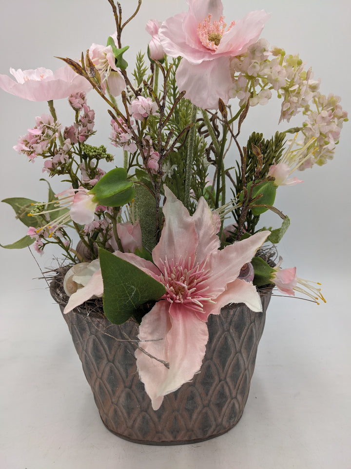 Frühlingsgesteck Clematis Schnecke weiss rosa