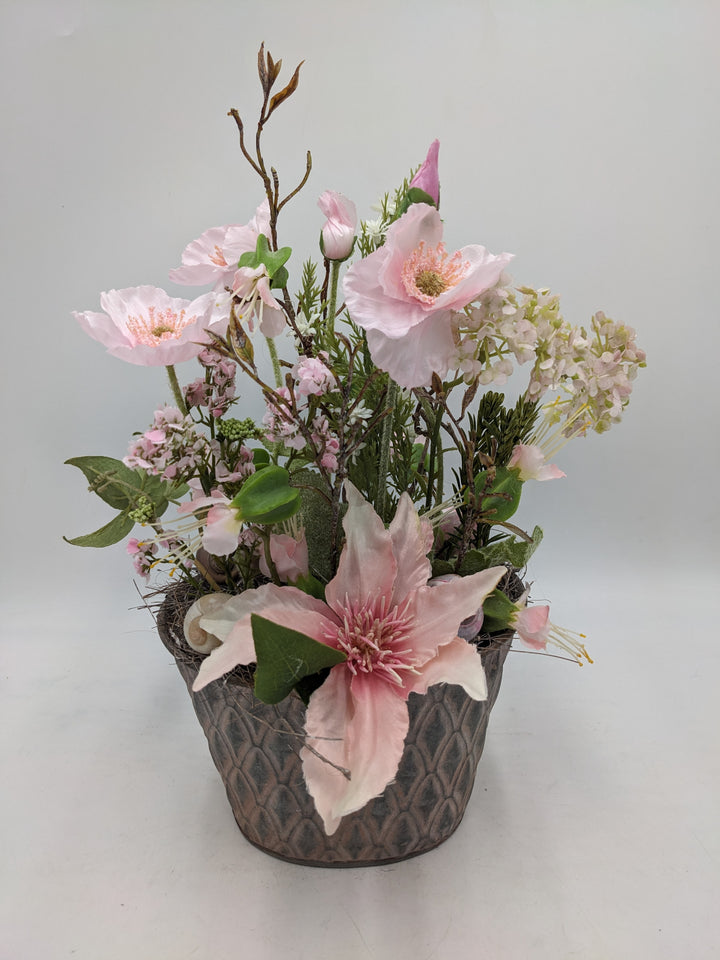 Frühlingsgesteck Clematis Schnecke weiss rosa