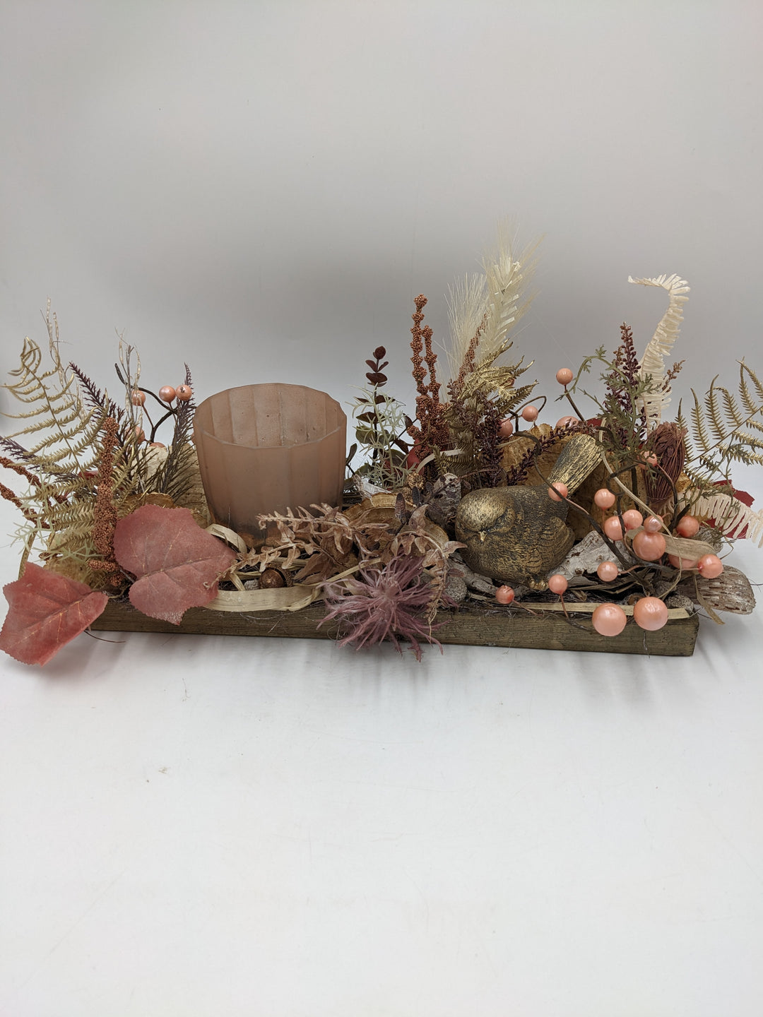 Herbstgesteck Teelicht Vogel Beeren gold