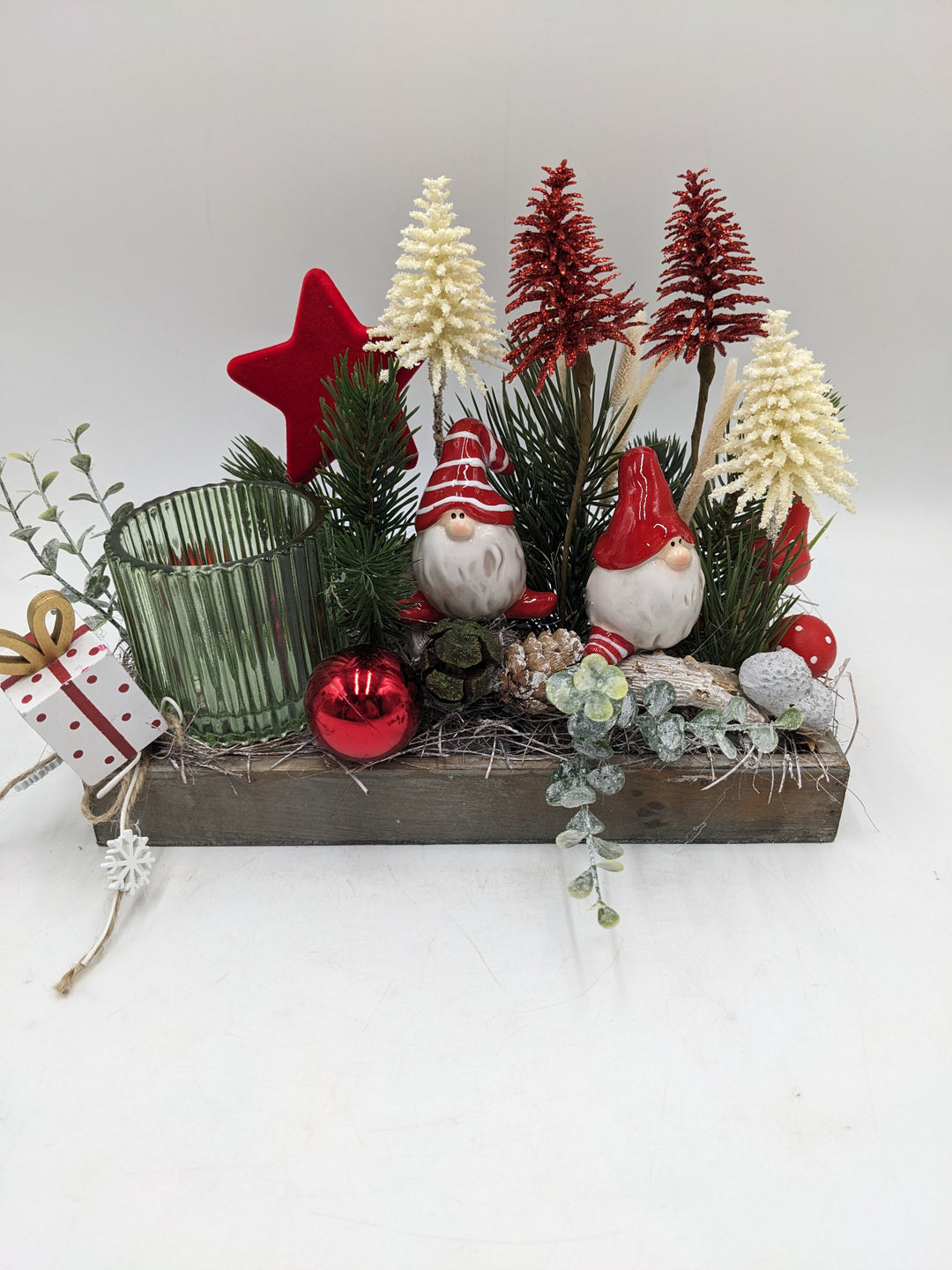 Weihnachtsgesteck Teelicht Bäume Pilze rot grün