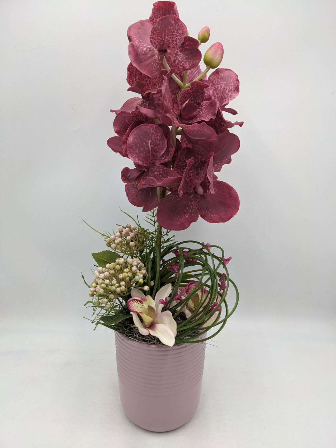 Frühlingsgesteck Orchidee Gräser rosenholz rosa