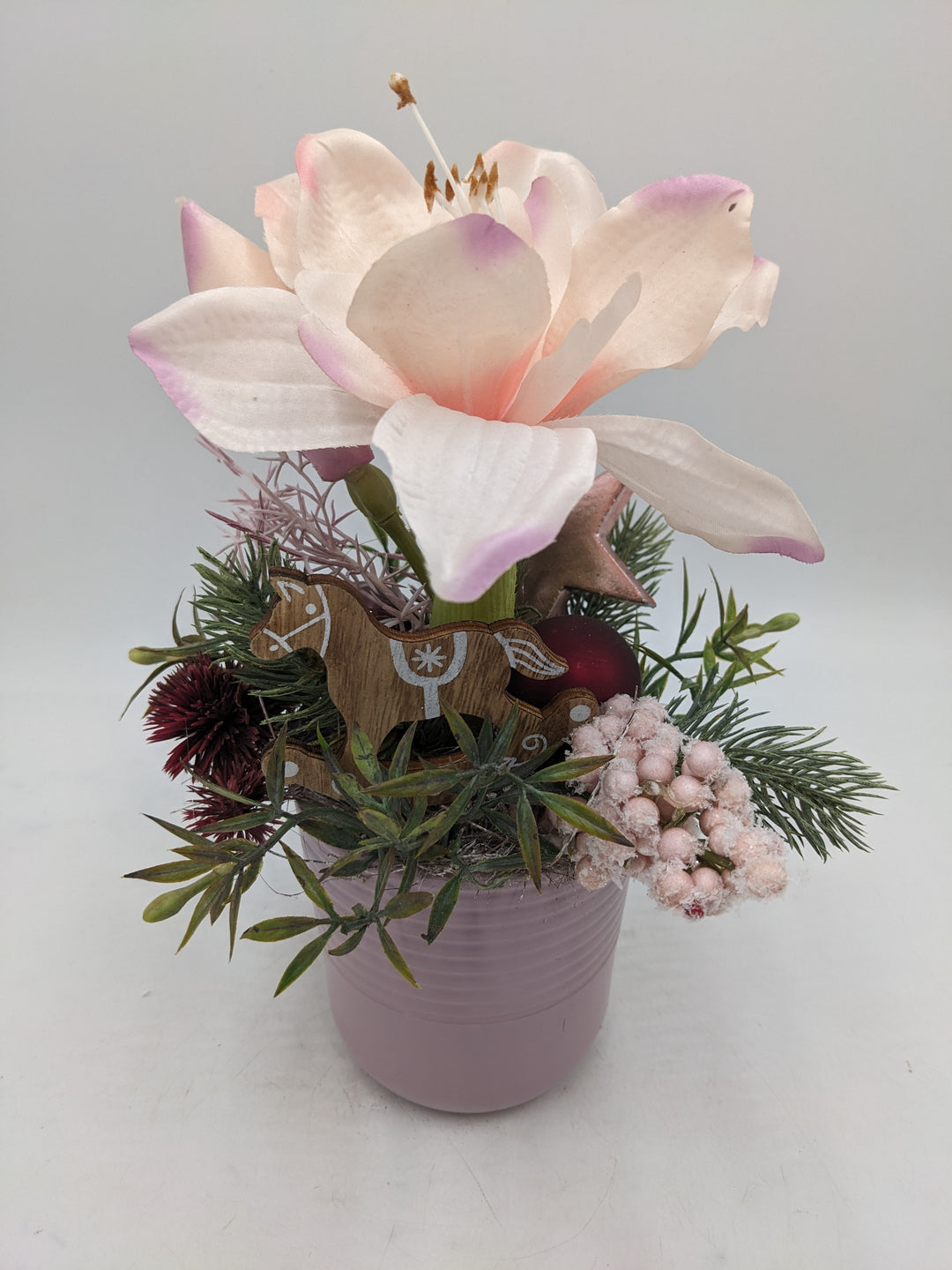 Wintergesteck Amaryllis Distel Stern rosa