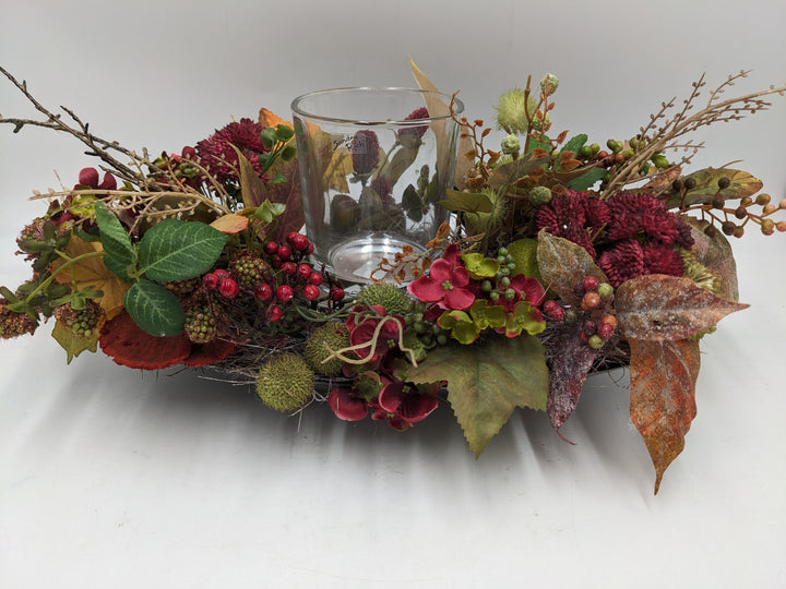 Herbstgesteck Teelicht Hortensie Beeren Sedum