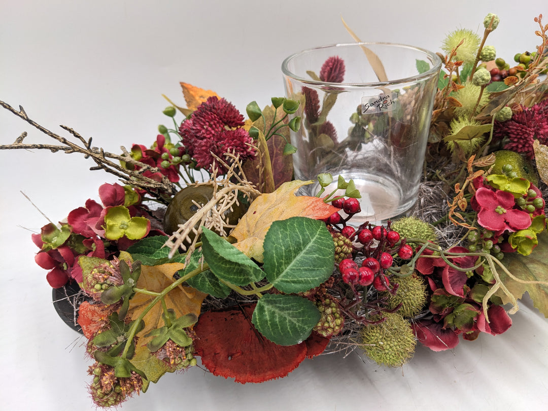 Herbstgesteck Teelicht Hortensie Beeren Sedum