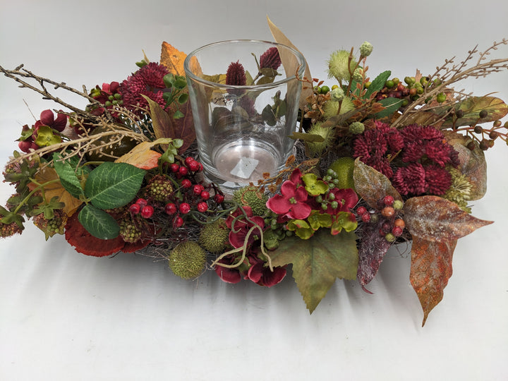 Herbstgesteck Teelicht Hortensie Beeren Sedum